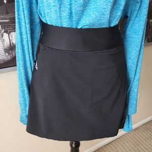 Women's black Adidas Golf Skort